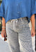 Everyone’s favorite barrel jean is back in a fun new print! These high waisted gray leopard print jeans are the perfect way to add a little personality to your everyday wardrobe while still keeping things neutral and easy to style. The barrel leg silhouette gives them that trendy, relaxed look everyone loves, while the drawstring detail adds an extra touch of comfort and casual charm. The gray-toned leopard print feels fresh and versatile, making these jeans easy to pair with everything.