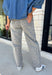 Everyone’s favorite barrel jean is back in a fun new print! These high waisted gray leopard print jeans are the perfect way to add a little personality to your everyday wardrobe while still keeping things neutral and easy to style. The barrel leg silhouette gives them that trendy, relaxed look everyone loves, while the drawstring detail adds an extra touch of comfort and casual charm. The gray-toned leopard print feels fresh and versatile, making these jeans easy to pair with everything.