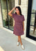From busy weekdays to weekend plans, this striped dress is the effortless piece you'll find yourself reaching for again and again! Designed with classic plum and tan stripes, this lightweight dress offers the perfect mix of comfort and polished style for the season. The adjustable self-tie waist creates a flattering silhouette, while the contrast ribbed neckline and sleeve cuffs add a sporty-chic touch that makes this dress stand out. 