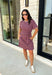 From busy weekdays to weekend plans, this striped dress is the effortless piece you'll find yourself reaching for again and again! Designed with classic plum and tan stripes, this lightweight dress offers the perfect mix of comfort and polished style for the season. The adjustable self-tie waist creates a flattering silhouette, while the contrast ribbed neckline and sleeve cuffs add a sporty-chic touch that makes this dress stand out. 
