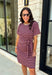 From busy weekdays to weekend plans, this striped dress is the effortless piece you'll find yourself reaching for again and again! Designed with classic plum and tan stripes, this lightweight dress offers the perfect mix of comfort and polished style for the season. The adjustable self-tie waist creates a flattering silhouette, while the contrast ribbed neckline and sleeve cuffs add a sporty-chic touch that makes this dress stand out. 