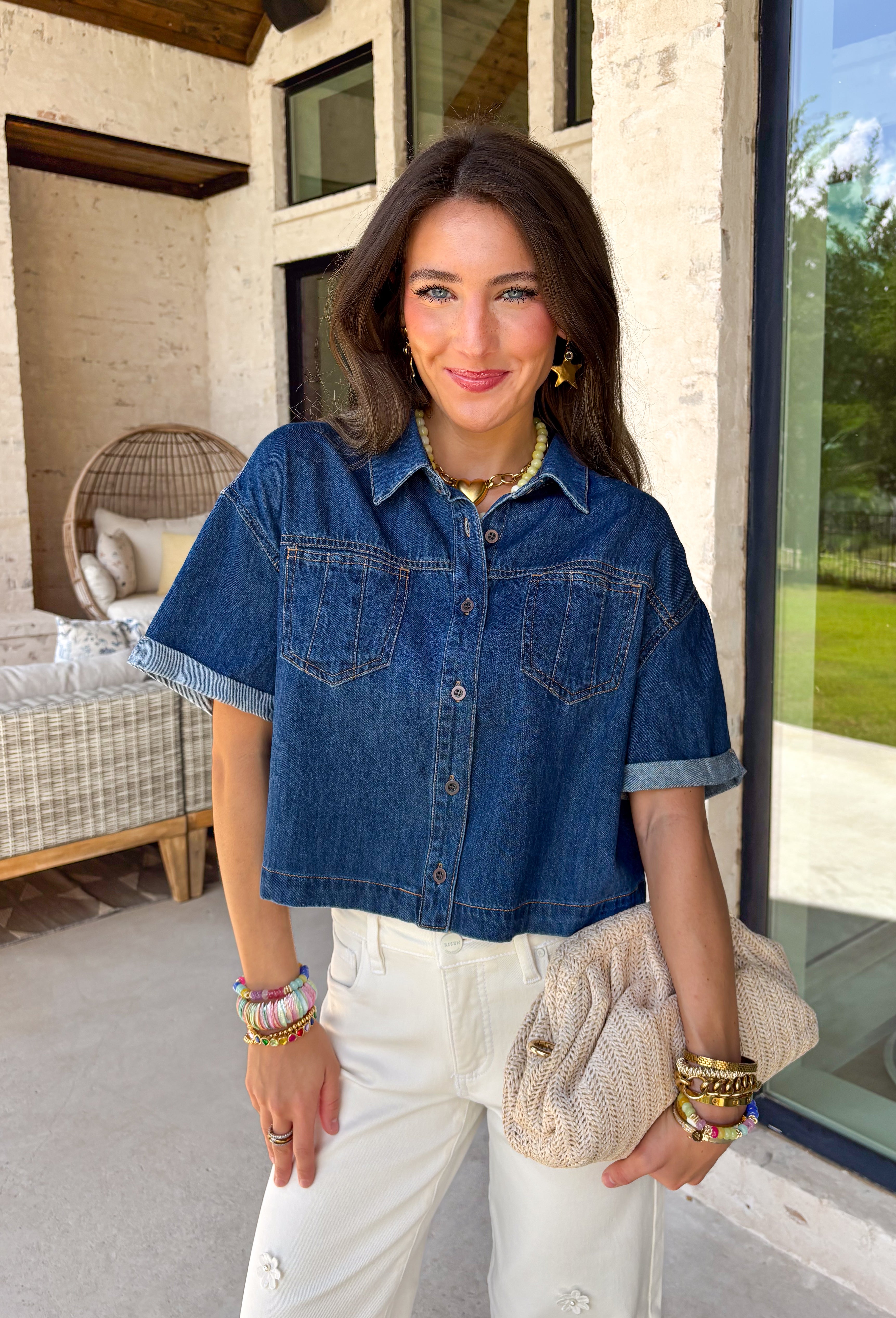 A true wardrobe staple with endless styling options! This dark wash denim button down top by Risen is the perfect mix of classic and cool. The rich wash gives it a polished feel, while the relaxed silhouette keeps it easy and laid-back. Designed with cuffed sleeves and front pocket details, this top has that effortless, throw-on-and-go vibe you’ll reach for again and again. Made from 100% cotton, it’s breathable, durable, and perfect for layering or wearing on its own.