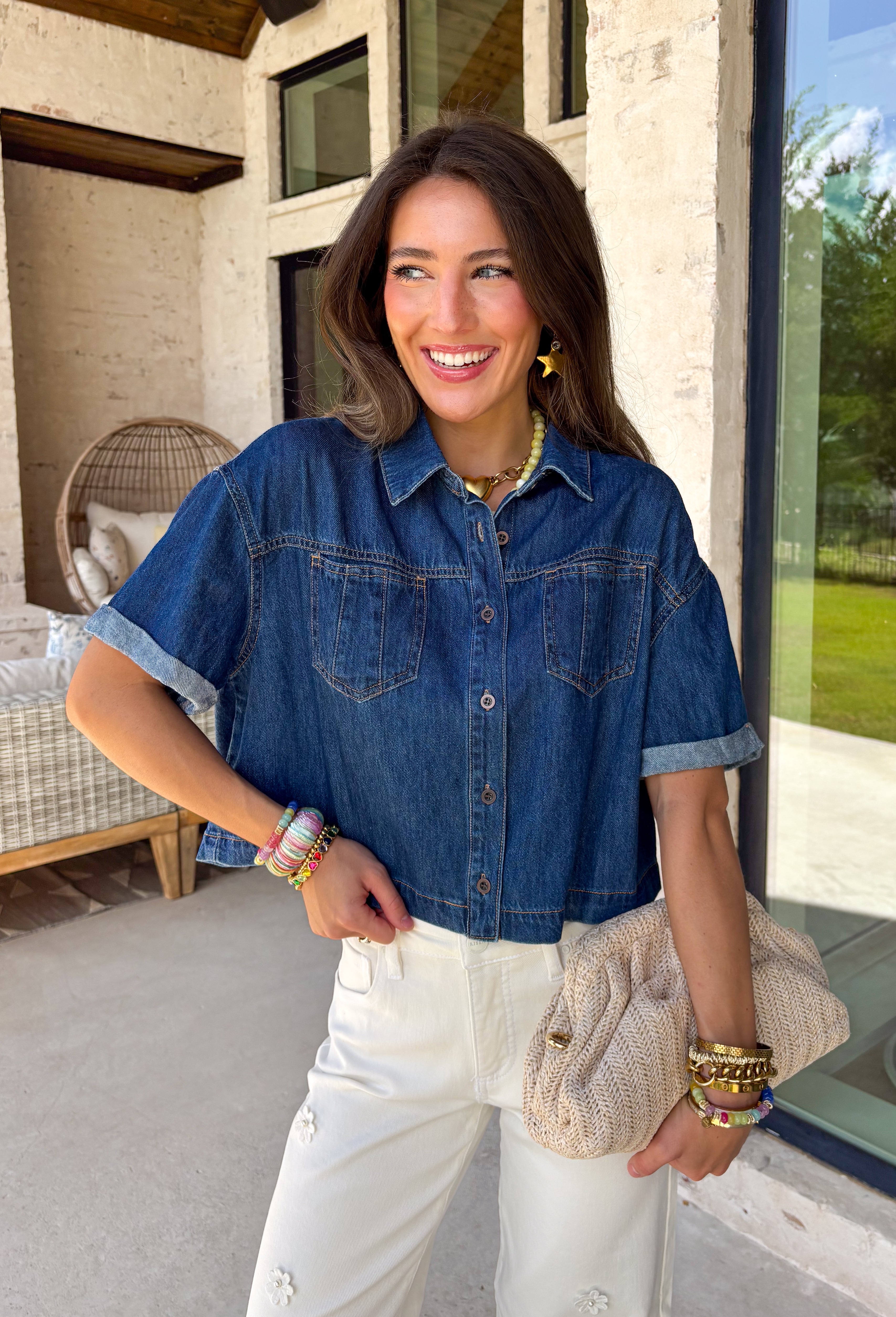 A true wardrobe staple with endless styling options! This dark wash denim button down top by Risen is the perfect mix of classic and cool. The rich wash gives it a polished feel, while the relaxed silhouette keeps it easy and laid-back. Designed with cuffed sleeves and front pocket details, this top has that effortless, throw-on-and-go vibe you’ll reach for again and again. Made from 100% cotton, it’s breathable, durable, and perfect for layering or wearing on its own.