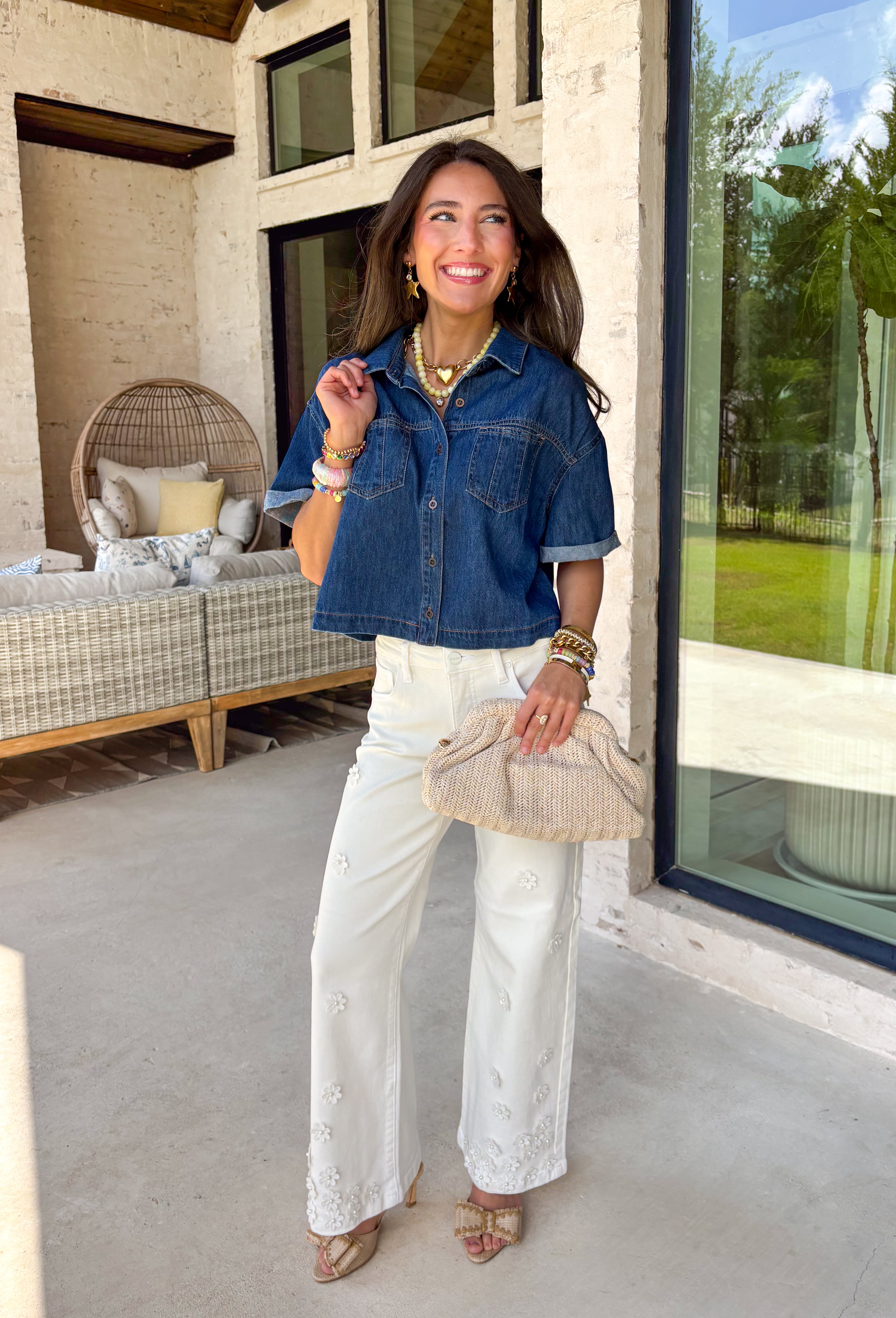 A true wardrobe staple with endless styling options! This dark wash denim button down top by Risen is the perfect mix of classic and cool. The rich wash gives it a polished feel, while the relaxed silhouette keeps it easy and laid-back. Designed with cuffed sleeves and front pocket details, this top has that effortless, throw-on-and-go vibe you’ll reach for again and again. Made from 100% cotton, it’s breathable, durable, and perfect for layering or wearing on its own.