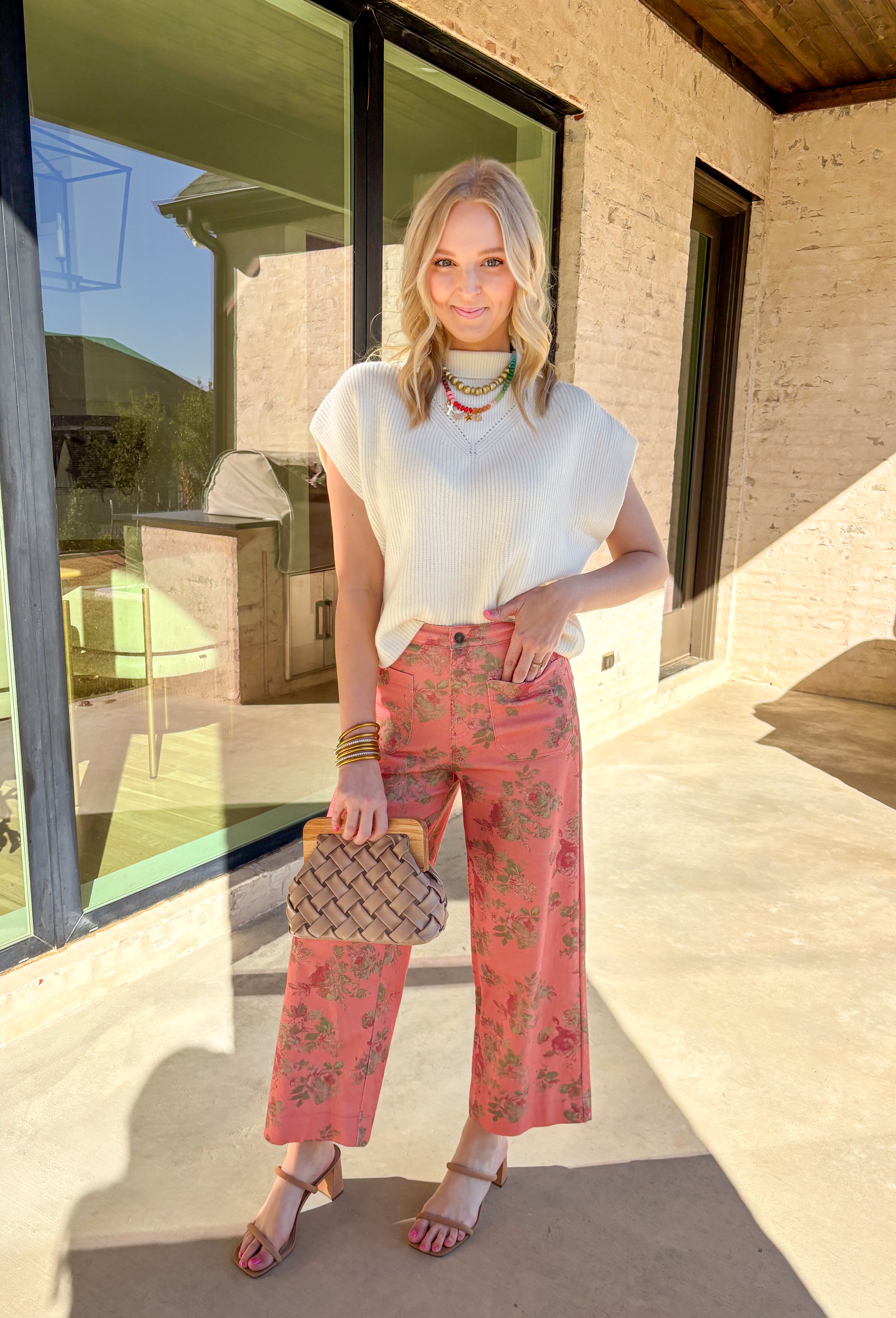 Soft, cozy, and perfect for spring layering, this cream short sleeve sweater by Entro is an easy wardrobe favorite. Designed with a mock neck and ribbed knit texture, it has a clean, polished look that still feels relaxed and comfortable. Subtle open knit detailing along the front adds just the right amount of texture and interest, making it a simple piece that doesn’t feel basic. Lightweight and easy to style, it’s perfect for transitioning into warmer days.