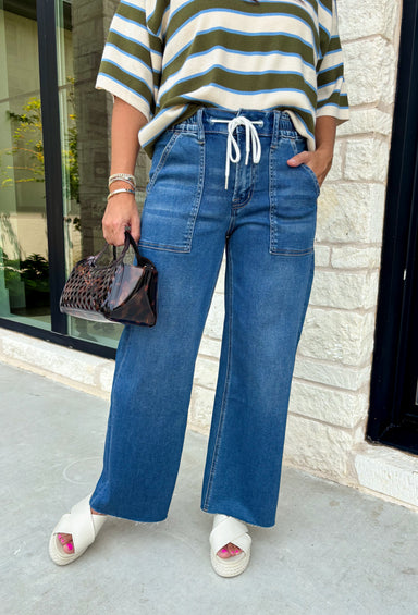 Everyone’s favorite jean just got even more comfortable! These medium wash wide leg jeans combine the relaxed feel of your favorite lounge pants with the polished look of classic denim. Designed with an elastic waistband and adjustable drawstring, they offer an easy, flattering fit you'll want to wear every day. The wide leg silhouette keeps them right on trend, while the soft modal blend gives them an incredibly comfortable feel.