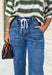 Everyone’s favorite jean just got even more comfortable! These medium wash wide leg jeans combine the relaxed feel of your favorite lounge pants with the polished look of classic denim. Designed with an elastic waistband and adjustable drawstring, they offer an easy, flattering fit you'll want to wear every day. The wide leg silhouette keeps them right on trend, while the soft modal blend gives them an incredibly comfortable feel.