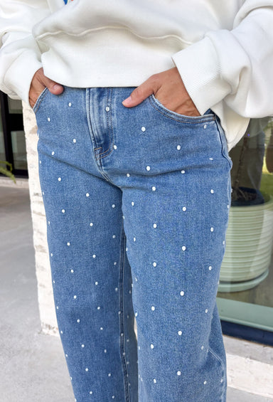 Add a playful twist to your everyday denim with these standout barrel jeans from Risen. Designed in a classic medium wash, these high-rise cropped jeans feature embroidered polka dots throughout for a fun, feminine detail that's easy to wear. The on-trend barrel leg silhouette creates a relaxed yet flattering fit, while the comfortable stretch fabric keeps you feeling great from morning to night. 