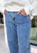 Add a playful twist to your everyday denim with these standout barrel jeans from Risen. Designed in a classic medium wash, these high-rise cropped jeans feature embroidered polka dots throughout for a fun, feminine detail that's easy to wear. The on-trend barrel leg silhouette creates a relaxed yet flattering fit, while the comfortable stretch fabric keeps you feeling great from morning to night. 