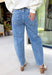 Add a playful twist to your everyday denim with these standout barrel jeans from Risen. Designed in a classic medium wash, these high-rise cropped jeans feature embroidered polka dots throughout for a fun, feminine detail that's easy to wear. The on-trend barrel leg silhouette creates a relaxed yet flattering fit, while the comfortable stretch fabric keeps you feeling great from morning to night. 