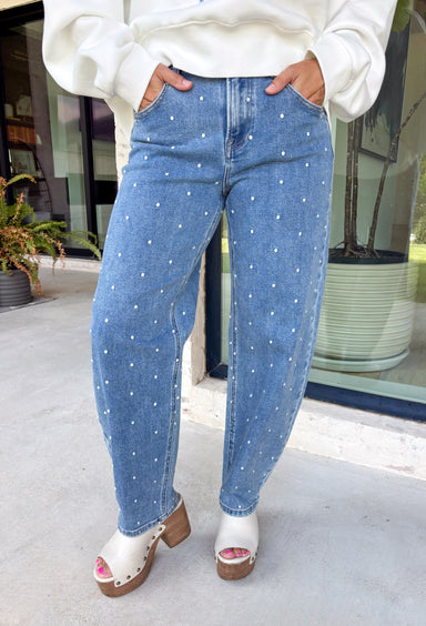 Add a playful twist to your everyday denim with these standout barrel jeans from Risen. Designed in a classic medium wash, these high-rise cropped jeans feature embroidered polka dots throughout for a fun, feminine detail that's easy to wear. The on-trend barrel leg silhouette creates a relaxed yet flattering fit, while the comfortable stretch fabric keeps you feeling great from morning to night. 