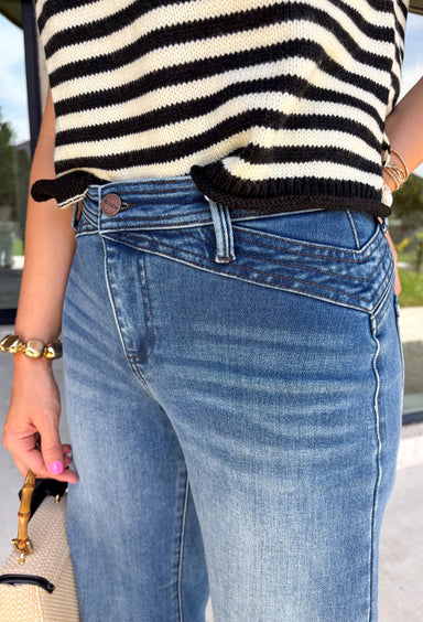 A great pair of dark wash denim never goes out of style, and these wide leg jeans are a closet staple you'll wear year-round. Designed with a flattering wide leg silhouette and a clean-cut finish, they offer the perfect balance of timeless style and everyday comfort. Dress them up with a blouse and heels for the office or pair them with your favorite sweater and sneakers for an effortless weekend look. 