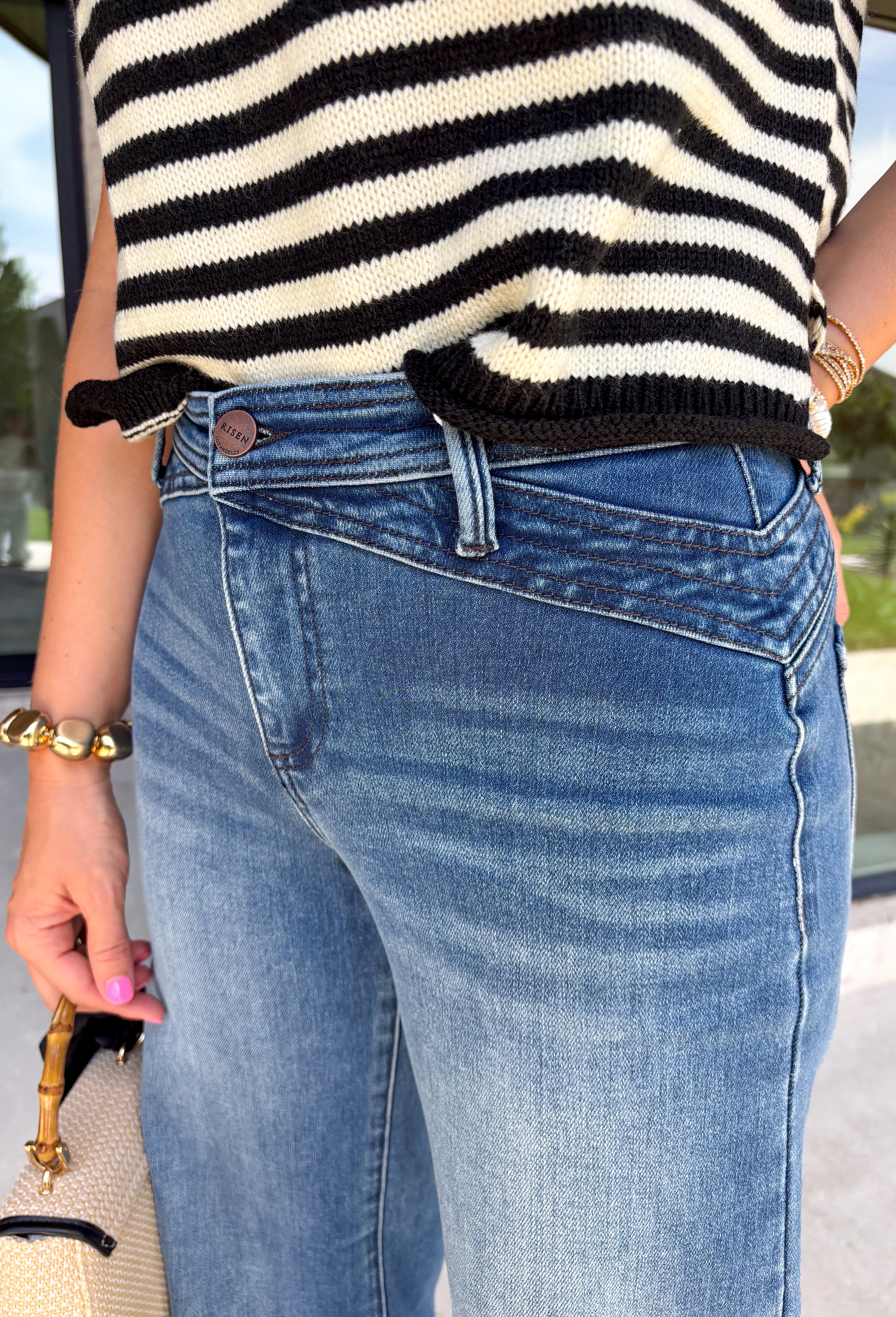 A great pair of dark wash denim never goes out of style, and these wide leg jeans are a closet staple you'll wear year-round. Designed with a flattering wide leg silhouette and a clean-cut finish, they offer the perfect balance of timeless style and everyday comfort. Dress them up with a blouse and heels for the office or pair them with your favorite sweater and sneakers for an effortless weekend look. 