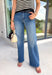 A great pair of dark wash denim never goes out of style, and these wide leg jeans are a closet staple you'll wear year-round. Designed with a flattering wide leg silhouette and a clean-cut finish, they offer the perfect balance of timeless style and everyday comfort. Dress them up with a blouse and heels for the office or pair them with your favorite sweater and sneakers for an effortless weekend look. 