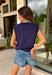 This navy graphic tank is made for celebrating summer and everything that comes with it! Featuring “Land Of The Free Because Of The Brave” with red, white, and blue star details, it brings the perfect patriotic touch for the 4th of July and beyond. The mix of printed and embroidered elements adds dimension and makes it feel extra special. Lightweight and breathable in 100% cotton, it’s perfect for warm days filled with BBQs, fireworks, and time with friends and family. 