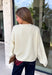 A classic cardigan is a wardrobe staple you'll wear year after year, and this timeless style from Double Zero is the perfect addition to your collection. Designed in a soft cream knit, this cozy cardigan features beautiful tortoise buttons that add a warm, elevated touch to its classic silhouette. Ribbed detailing at the neckline, hem, and cuffs creates a polished finish, while the soft knit keeps you comfortable all day long. 