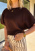 Wrap yourself in effortless fall style with this cozy brown short sleeve sweater! The rich autumn hue makes it a staple you'll reach for again and again, while the relaxed dolman sleeves create an easy, comfortable fit that's both flattering and timeless. Wide ribbed sleeve bands, a classic ribbed round neckline, and a ribbed hem add elevated finishing touches to this versatile knit. 