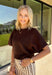 Wrap yourself in effortless fall style with this cozy brown short sleeve sweater! The rich autumn hue makes it a staple you'll reach for again and again, while the relaxed dolman sleeves create an easy, comfortable fit that's both flattering and timeless. Wide ribbed sleeve bands, a classic ribbed round neckline, and a ribbed hem add elevated finishing touches to this versatile knit. 