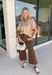 Wrap yourself in effortless fall style with this cozy oatmeal short sleeve sweater! This neutral autumn hue makes it a staple you'll reach for again and again, while the relaxed dolman sleeves create an easy, comfortable fit that's both flattering and timeless. Wide ribbed sleeve bands, a classic ribbed round neckline, and a ribbed hem add elevated finishing touches to this versatile knit. 
