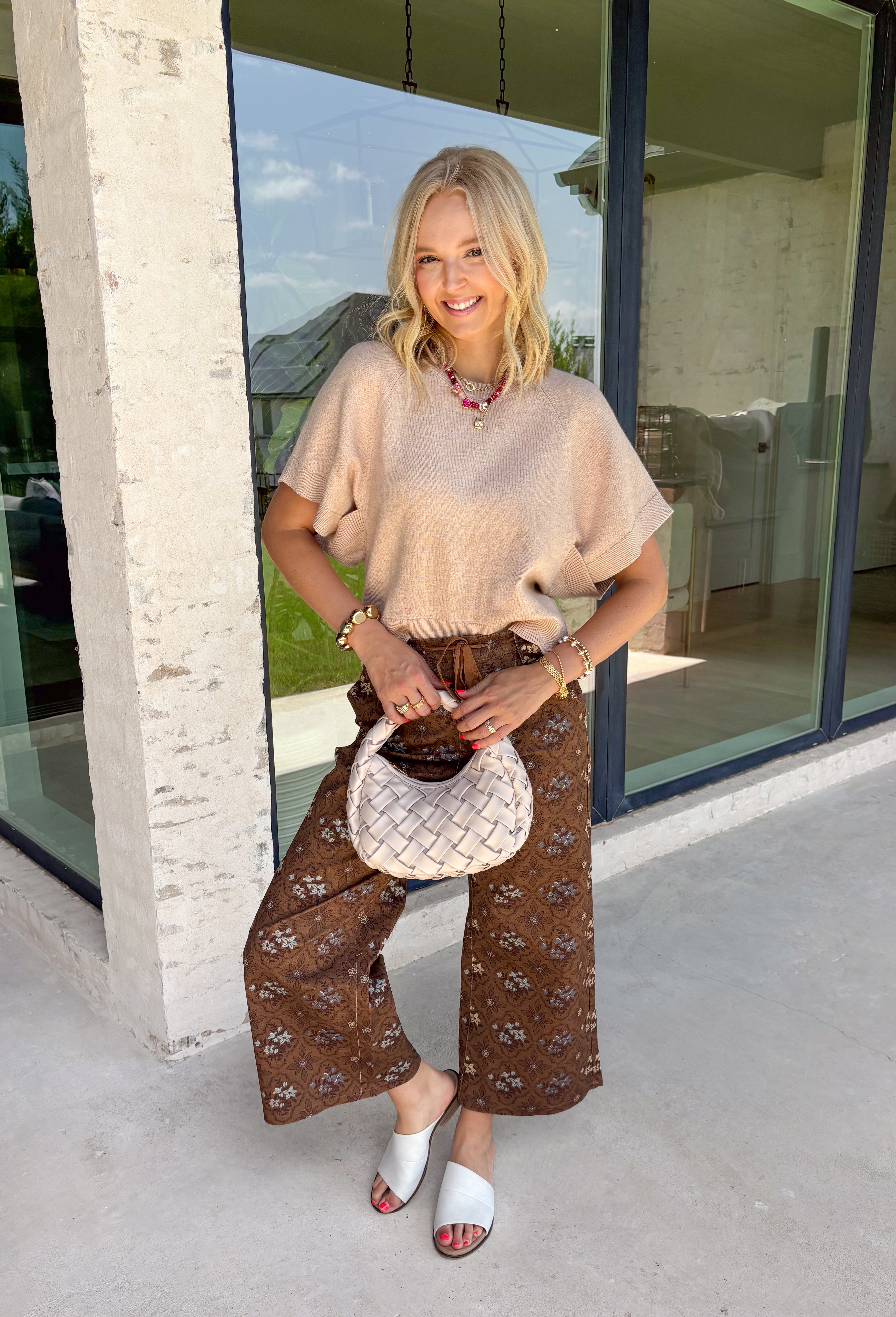 Wrap yourself in effortless fall style with this cozy oatmeal short sleeve sweater! This neutral autumn hue makes it a staple you'll reach for again and again, while the relaxed dolman sleeves create an easy, comfortable fit that's both flattering and timeless. Wide ribbed sleeve bands, a classic ribbed round neckline, and a ribbed hem add elevated finishing touches to this versatile knit. 