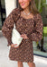 A classic leopard print never goes out of style, and this stunning dress is the perfect way to wear it this season. Designed with an effortlessly flattering silhouette, this timeless piece features a feminine square neckline and a beautiful open-back tie detail for an elevated touch. The smocked back provides a comfortable, flexible fit, while the long sleeves with smocked cuffs add soft volume and charm. 