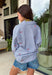 This blue and white stripe button down is the perfect blend of classic style and patriotic charm! Featuring embroidered American flags throughout, it adds a fun, festive touch while still feeling timeless and easy to wear. The collared neckline and button down design give it that effortless, polished look you can style for everything from backyard BBQs to fireworks and holiday weekends. Lightweight and breathable, it’s the perfect layer for all your summer celebrations. 