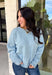 Wrap yourself in everyday comfort with this cozy sweater from Hyfve. Designed in a soft light blue hue, this timeless knit is elevated with a contrasting gray neckline for a subtle touch of detail. Exposed seam accents give it a relaxed, lived-in feel, while the ribbed hem and cuffs create a classic finish. Crafted from an ultra-soft knit, this versatile sweater is perfect for layering on crisp fall mornings or wearing on its own throughout the season.
