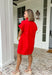 This red short sleeve dress is the bold, effortless piece your summer wardrobe needs! Made from a breathable cotton-linen blend, it’s lightweight and perfect for staying cool while still looking put together. The hidden button down design keeps the look clean and elevated, giving it that easy shirt dress feel you can dress up or down. Whether you're heading to lunch, work, or weekend plans, this dress brings the perfect pop of color. Just add sandals or sneakers and you’re set—don’t miss this one!