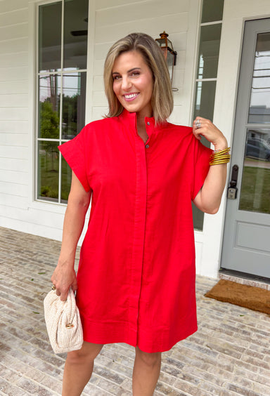 This red short sleeve dress is the bold, effortless piece your summer wardrobe needs! Made from a breathable cotton-linen blend, it’s lightweight and perfect for staying cool while still looking put together. The hidden button down design keeps the look clean and elevated, giving it that easy shirt dress feel you can dress up or down. Whether you're heading to lunch, work, or weekend plans, this dress brings the perfect pop of color. Just add sandals or sneakers and you’re set—don’t miss this one!