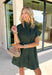 This forest green short sleeve dress is the perfect, effortless piece your fall wardrobe needs! The hidden button down design keeps the look clean and elevated, giving it that easy shirt dress feel you can dress up or down. Whether you're heading to lunch, work, or weekend plans, this dress brings the perfect pop of color. Just add some mules or sneakers and you’re set—don’t miss this one!