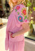 This pink dress is giving soft spring sweetness with the cutest pop of color! The colorful floral embroidery on the puff sleeves (hello yellow, pink, red, green, and blue!) makes it feel extra special, while the magenta trim along the neckline adds a fresh, happy finish. The tiered skirt brings that breezy, flowy movement we love, and since it’s fully lined, you can wear it with confidence all day long. It’s the perfect “throw on and feel adorable” dress for brunch, showers, and all your spring plans.