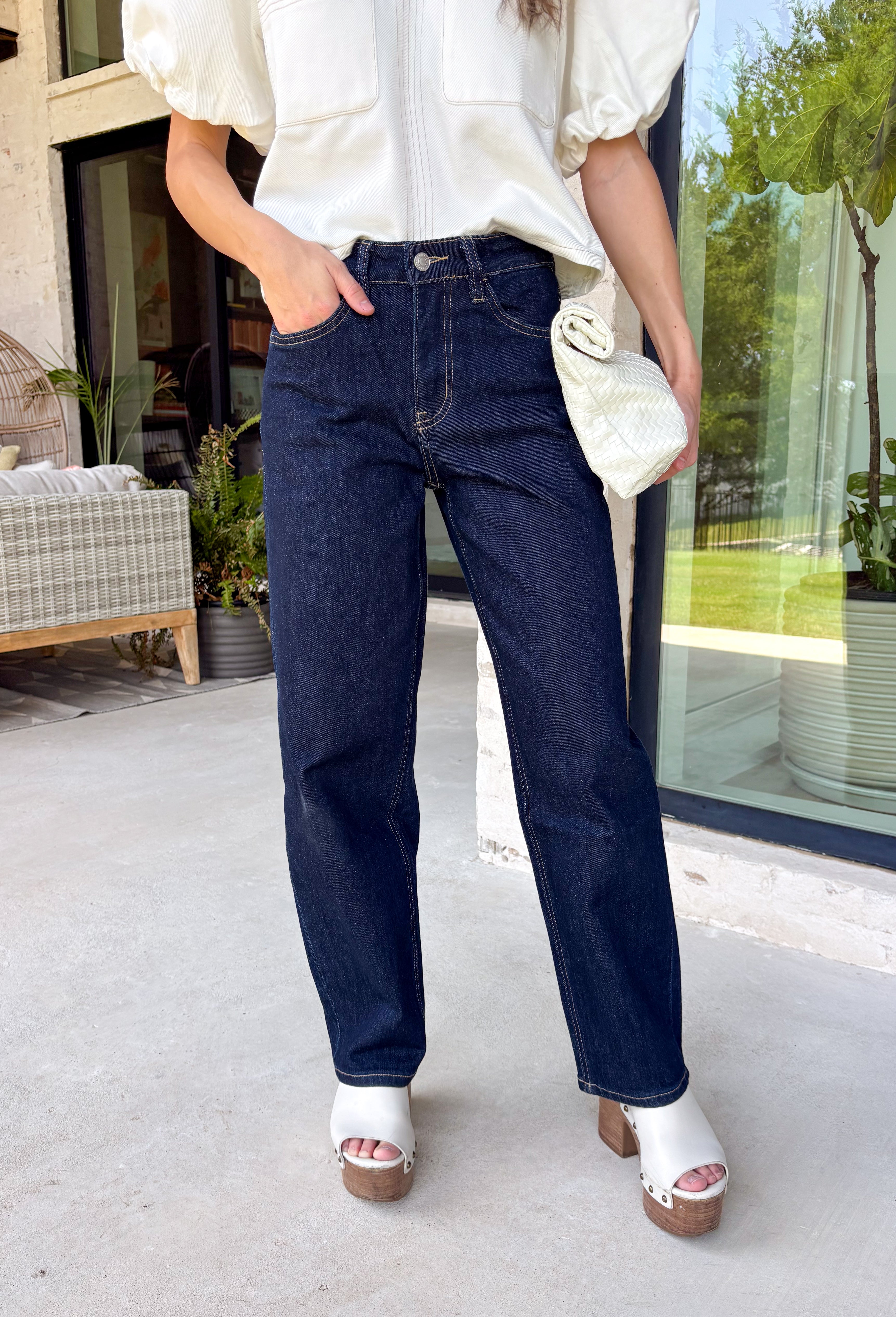 Meet your new favorite everyday denim! These dark wash slim barrel jeans combine the trend-forward barrel silhouette with a more streamlined fit, creating a look that's both modern and incredibly wearable. The flattering high-rise waist offers all-day comfort while helping create a polished silhouette, and the rich dark wash makes them easy to dress up or down.