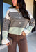 Wrap yourself in cozy comfort with this charming cardigan from Entro. Designed with a soft ecru knit and classic brown stripes, this timeless sweater gets a fresh pop of color from mint trim along the neckline, hem, and cuffs. The button-front design makes it easy to wear open over your favorite basics or buttoned up as a sweater, while the ultra-soft knit blend keeps you warm and comfortable all season long. 