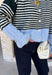 Wrap yourself in cozy comfort with this charming cardigan from Entro. Designed with a soft hunter knit and classic off white stripes, this timeless sweater gets a fresh pop of color from a light blue trim along the neckline, hem, and cuffs. The button-front design makes it easy to wear open over your favorite basics or buttoned up as a sweater, while the ultra-soft knit blend keeps you warm and comfortable all season long. 