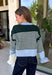 Wrap yourself in cozy comfort with this charming cardigan from Entro. Designed with a soft hunter knit and classic off white stripes, this timeless sweater gets a fresh pop of color from a light blue trim along the neckline, hem, and cuffs. The button-front design makes it easy to wear open over your favorite basics or buttoned up as a sweater, while the ultra-soft knit blend keeps you warm and comfortable all season long. 