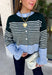 Wrap yourself in cozy comfort with this charming cardigan from Entro. Designed with a soft hunter knit and classic off white stripes, this timeless sweater gets a fresh pop of color from a light blue trim along the neckline, hem, and cuffs. The button-front design makes it easy to wear open over your favorite basics or buttoned up as a sweater, while the ultra-soft knit blend keeps you warm and comfortable all season long. 