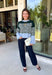 Wrap yourself in cozy comfort with this charming cardigan from Entro. Designed with a soft hunter knit and classic off white stripes, this timeless sweater gets a fresh pop of color from a light blue trim along the neckline, hem, and cuffs. The button-front design makes it easy to wear open over your favorite basics or buttoned up as a sweater, while the ultra-soft knit blend keeps you warm and comfortable all season long. 