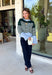 Wrap yourself in cozy comfort with this charming cardigan from Entro. Designed with a soft hunter knit and classic off white stripes, this timeless sweater gets a fresh pop of color from a light blue trim along the neckline, hem, and cuffs. The button-front design makes it easy to wear open over your favorite basics or buttoned up as a sweater, while the ultra-soft knit blend keeps you warm and comfortable all season long. 
