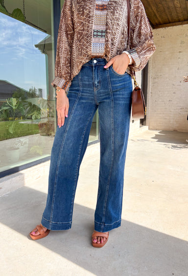 These wide leg jeans are giving instant cool-girl vibes with their luxurious drape and timeless wash. Made from comfort stretch denim, they hug just right at the high rise waist before flowing into an extreme wide leg silhouette that feels both elevated and effortless. The trouser-style hem and full-length inseam create a polished finish that pairs beautifully with boots, sneakers, or heels. In a versatile medium wash, they’re the perfect mix of classic and on-trend for your fall denim lineup.