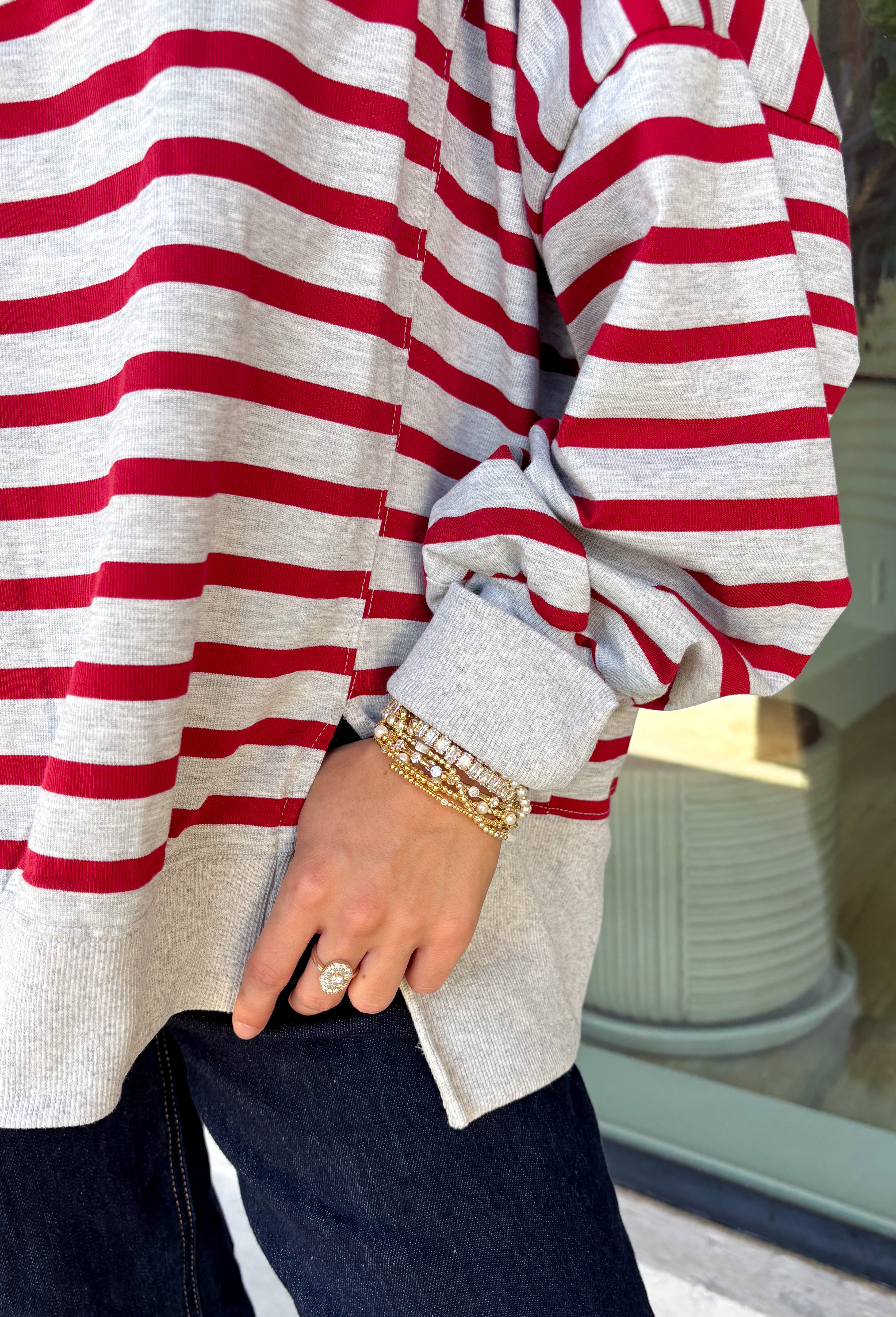 Easy layers are a must as fall starts turning into winter, and this lightweight pullover from Hyfve fits right into the season. The heather grey base is paired with dark red stripes for a cozy color combination that feels especially fitting as the holidays get closer. A mock neckline adds a little extra coverage without making the pullover feel too heavy, making it perfect for those in-between weather days. The soft fabric blend has a touch of stretch for comfortable all-day wear.