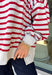 Easy layers are a must as fall starts turning into winter, and this lightweight pullover from Hyfve fits right into the season. The heather grey base is paired with dark red stripes for a cozy color combination that feels especially fitting as the holidays get closer. A mock neckline adds a little extra coverage without making the pullover feel too heavy, making it perfect for those in-between weather days. The soft fabric blend has a touch of stretch for comfortable all-day wear.