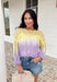 Soft, dreamy, and made for sunshine-filled days, this open knit sweater blends butter yellow and light purple in the prettiest ombré effect. The gradual color fade feels light and airy — perfect for bright spring mornings and breezy evenings. The open knit design gives it a breathable, relaxed feel while still offering cozy texture. Crafted from 100% cotton, it’s lightweight enough to layer now and wear on its own as temperatures warm up. 