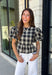 Nothing says fall quite like classic plaid! This black and tan plaid top brings timeless autumn style with a flattering structured babydoll silhouette that's easy to dress up or down. Feminine puff sleeves add a charming touch, while the back zipper closure creates a polished fit. Crafted from a breathable cotton blend, it's the perfect top for everything from pumpkin patch adventures and weekend brunches to casual office days and family gatherings.