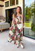 Beautifully feminine and full of rich seasonal color, this floral midi dress is a timeless addition to your fall wardrobe. Designed in a stunning dark teal hue with a gorgeous floral print in warm autumn shades, this dress is perfect for everything from family photos to holiday gatherings. The straight neckline and pleated bodice create an elegant, flattering silhouette, while the adjustable straps and smocked back provide a comfortable, customizable fit. 