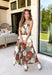 Beautifully feminine and full of rich seasonal color, this floral midi dress is a timeless addition to your fall wardrobe. Designed in a stunning dark teal hue with a gorgeous floral print in warm autumn shades, this dress is perfect for everything from family photos to holiday gatherings. The straight neckline and pleated bodice create an elegant, flattering silhouette, while the adjustable straps and smocked back provide a comfortable, customizable fit. 