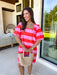 This pink and red striped mini dress by Entro is the definition of fun spring style. The bold stripe print makes a statement all on its own, while the short puff sleeves add that sweet, feminine touch we love. With a button-front design, it feels classic and easy to wear—perfect for those days when you want to look cute without having to think too hard about it.