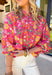 This pink long sleeve top is giving fresh-picked flower energy in the prettiest way. Featuring a colorful floral print in shades of green, yellow, orange, and white, it’s the kind of piece that instantly brightens your day (and your outfit). The pink base keeps it sweet, while the vibrant florals make it feel playful and ready for sunshine. Designed with front button details and elastic cuff sleeves, this top blends classic structure with easy comfort. 