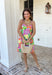 This sleeveless floral dress is bringing all the color and all the confidence. Featuring a bold mix of purple, orange, green, yellow, pink, and white, this beauty is made to stand out in the best way. The scalloped neckline and hem add the sweetest feminine touch, while the fabric-covered knotted bead straps give it that extra detail that feels fun and elevated. Designed with smocking along the back for a comfortable, flattering fit, this fully lined cotton dress is as easy to wear as it is eye-catching. 