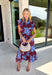 Embrace the beauty of the season in this stunning wine floral midi dress. Featuring a gorgeous blue and white floral print, this feminine dress is perfect for everything on your fall calendar. The self-tie belt cinches the waist for a flattering silhouette, while the ruffle sleeves and ruffle hem add soft movement and romantic charm. Finished with a button-down front, side pockets, and a fully lined design, this timeless cotton dress.