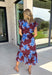 Embrace the beauty of the season in this stunning wine floral midi dress. Featuring a gorgeous blue and white floral print, this feminine dress is perfect for everything on your fall calendar. The self-tie belt cinches the waist for a flattering silhouette, while the ruffle sleeves and ruffle hem add soft movement and romantic charm. Finished with a button-down front, side pockets, and a fully lined design, this timeless cotton dress.